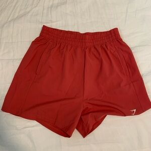 Gymshark Woven Pocket Shorts in Red